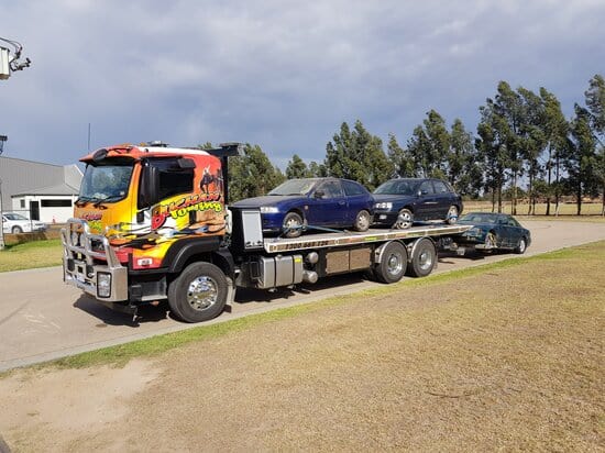 Buchan towing an Aussie Towing Truck with two vehicle towed