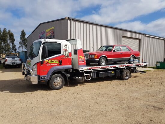 Bairnsdale tilt tray fleet towed a red car