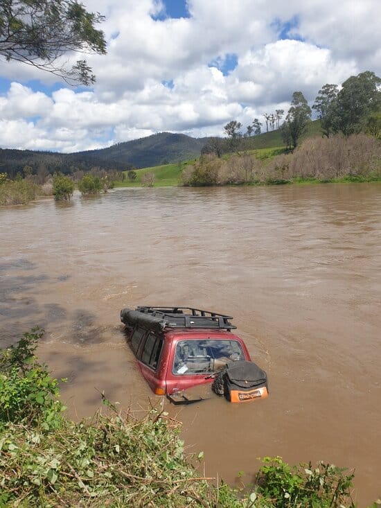 a car submerged in a lake via an accident